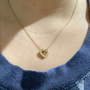 Gold chain with heart pendant